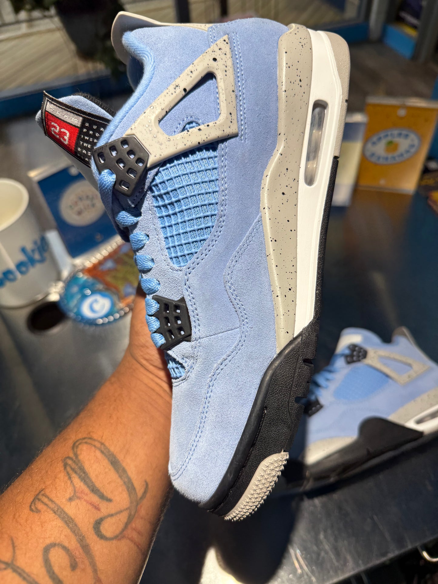 Air Jordan 4 Retro 'University Blue'
